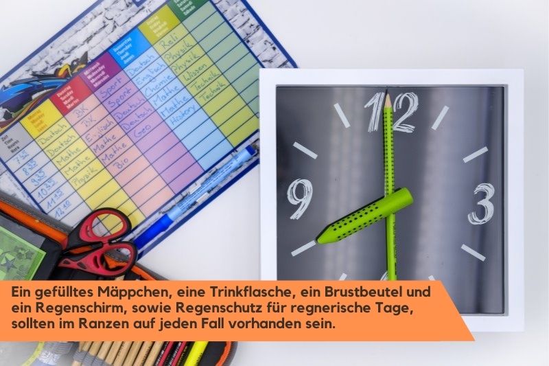 Schulutensilien Schulutensilien, wie Mäppchen und Stundenplan liegen auf einem Tisch
